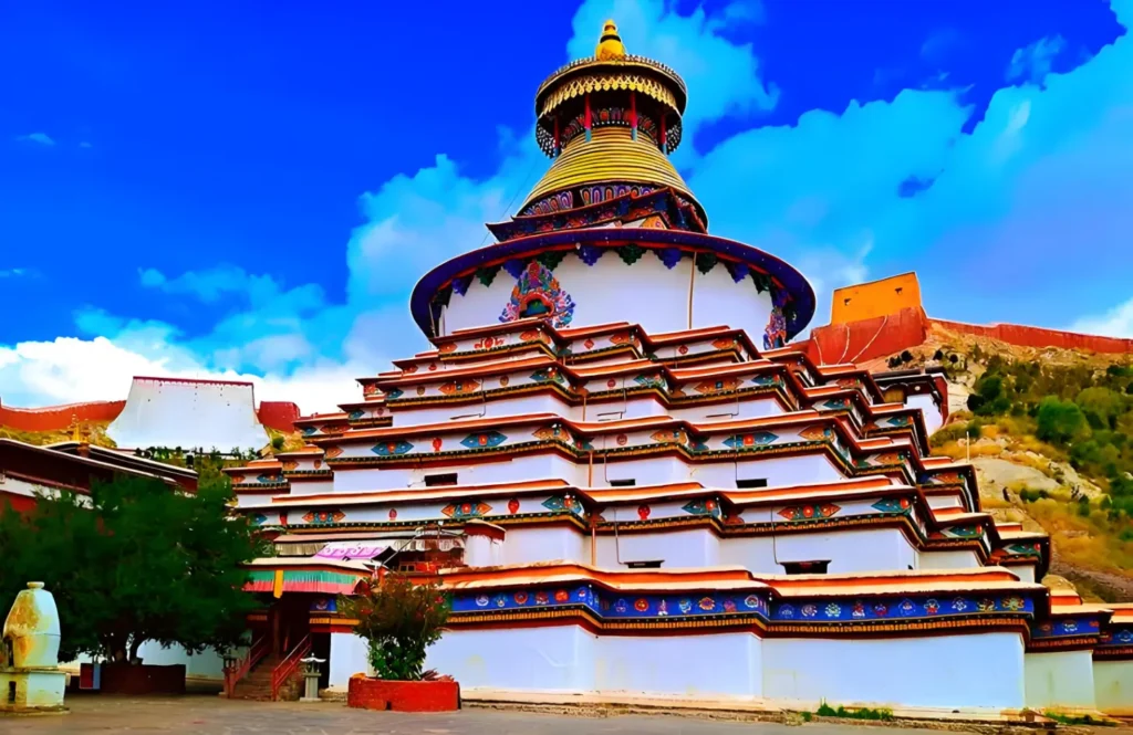 Multi-tiered Kumbum stupa and traditional temple buildings of the Pelkor Chode Monastery at Gyantse, Tibet