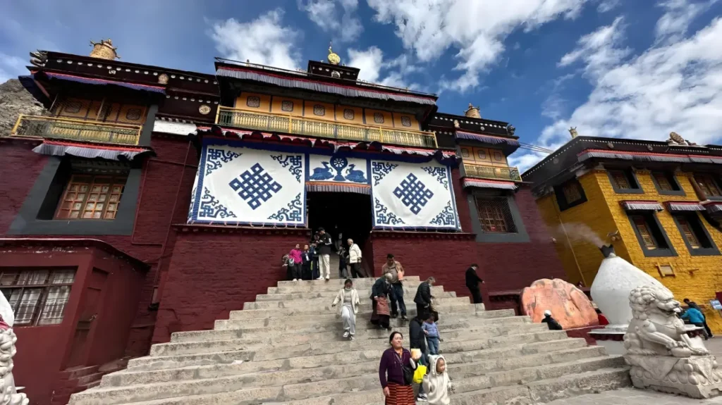 Tsurphu Monastery Lhasa Tibet is a classic Karma Kagyu sect temples, old Buddhist temples in Tibet, red stone monastery exterior.