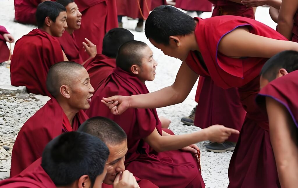 Tibetan Buddhist monks are practicing traditional philosophical monastic debates at a monastery in Lhasa