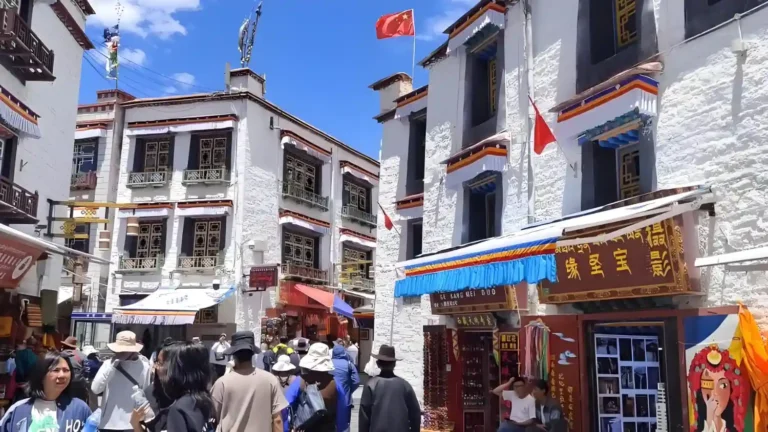 people walking around Barkhor Street in lhasa