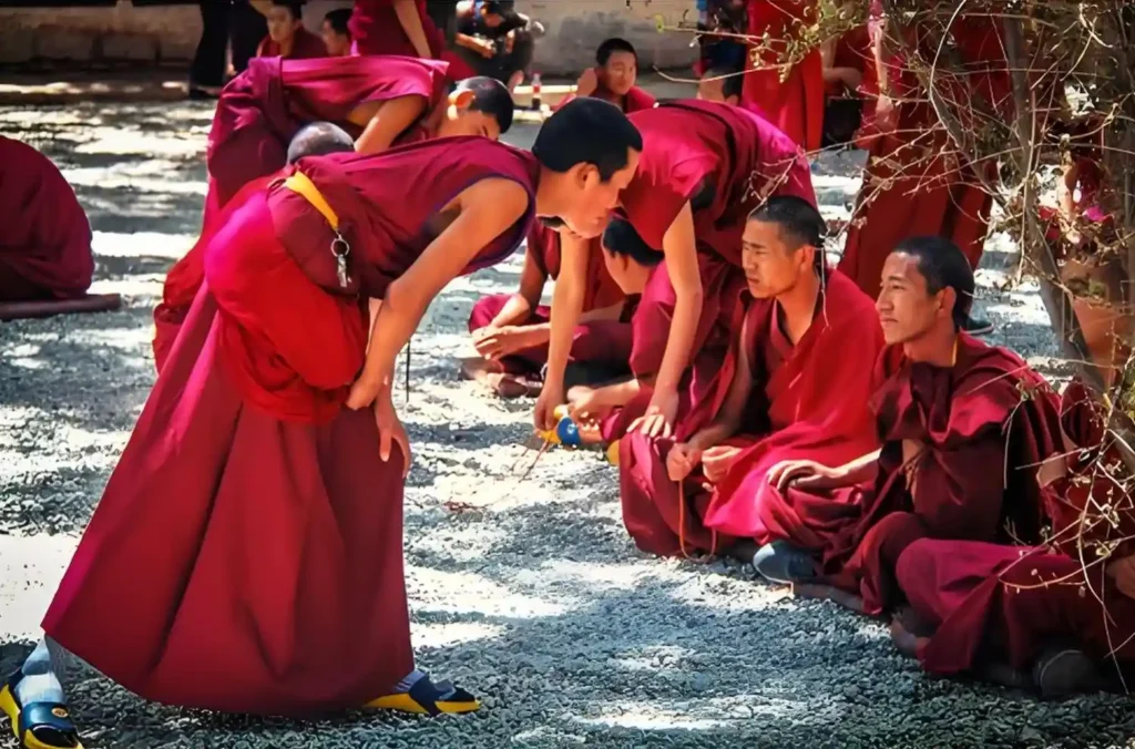 A group of young monks debating in  Sera Monastery