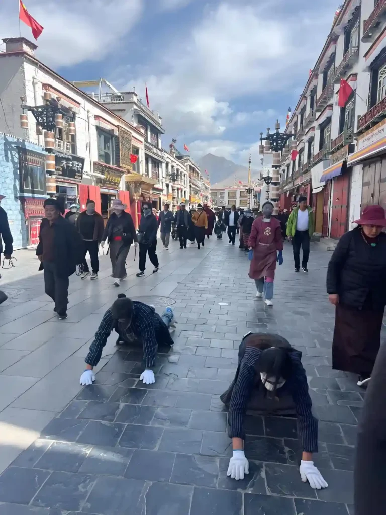 Tibetan performing Lhasa pilgrim circuits at Barkhor Street